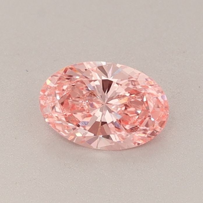 Loose Diamond - OVAL 0.44ct Fancy Vivid Pink VVS2: Loose Diamond - OVAL 0.44ct Fancy Vivid Pink VVS2 Source: This is a real non-mined Diamond that has been grown in a lab Shape: OVAL Carats: 0.44 Color: Fancy Vivid Pink Certification: IGI Video: