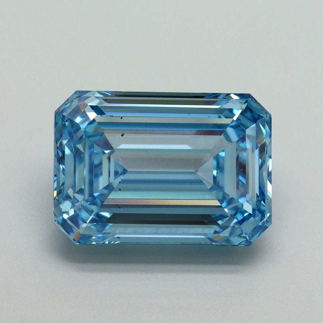 Loose Diamond - EMERALD 11.07ct Fancy Vivid Blue VS2: Loose Diamond - EMERALD 11.07ct Fancy Vivid Blue VS2 Source: This is a real non-mined Diamond that has been grown in a lab Shape: EMERALD Carats: 11.07 Color: Fancy Vivid Blue Certification: IGI Video
