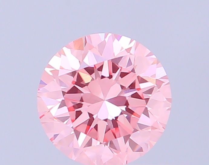 Loose Diamond - ROUND 0.45ct Fancy Vivid Pink VVS2: Loose Diamond - ROUND 0.45ct Fancy Vivid Pink VVS2 Source: This is a real non-mined Diamond that has been grown in a lab Shape: ROUND Carats: 0.45 Color: Fancy Vivid Pink Certification: IGI Video: