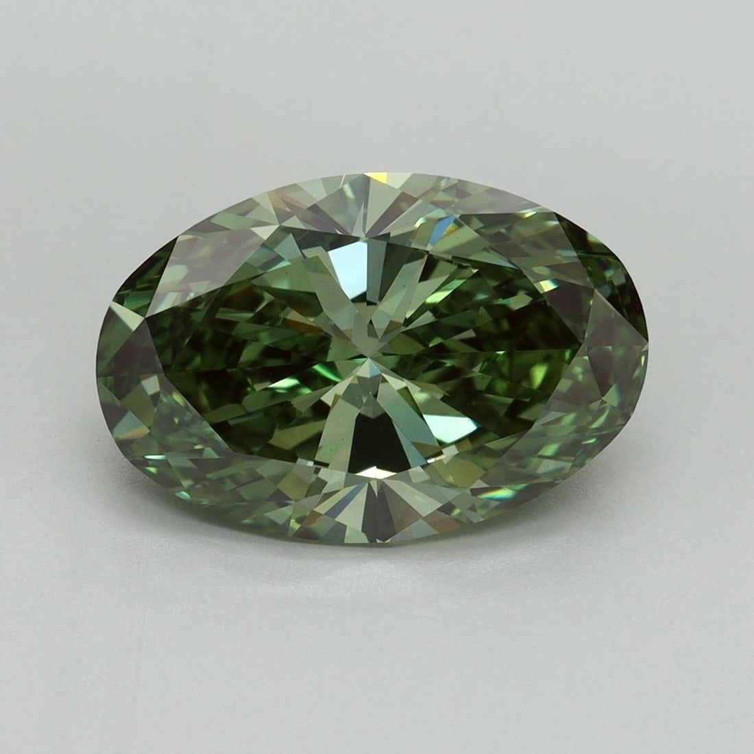 Loose Diamond - OVAL 4.14ct Fancy Vivid Green VS1: Loose Diamond - OVAL 4.14ct Fancy Vivid Green VS1 Source: This is a real non-mined Diamond that has been grown in a lab Shape: OVAL Carats: 4.14 Color: Fancy Vivid Green Certification: IGI Video: