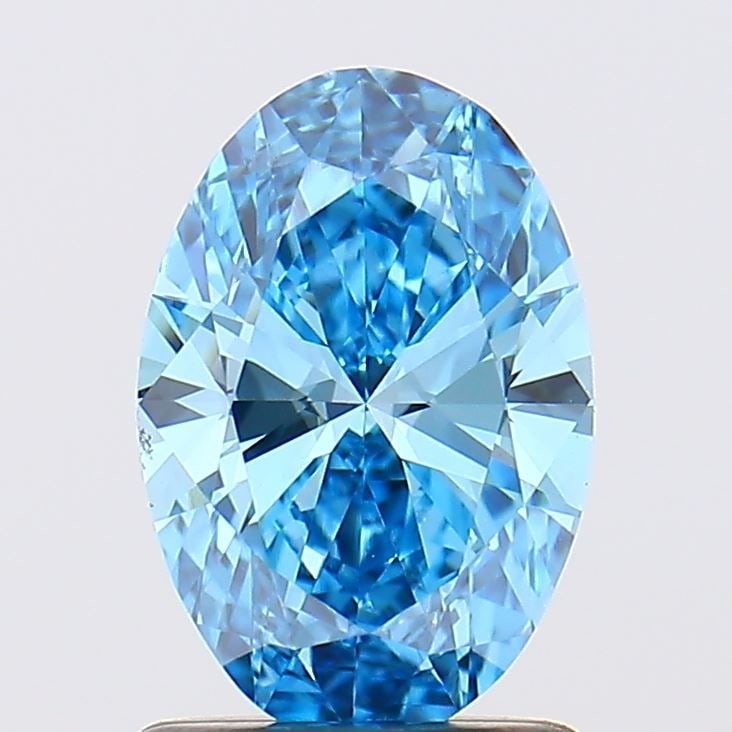 Loose Diamond - OVAL 1.01ct Fancy Vivid Blue VS2: Loose Diamond - OVAL 1.01ct Fancy Vivid Blue VS2 Source: This is a real non-mined Diamond that has been grown in a lab Shape: OVAL Carats: 1.01 Color: Fancy Vivid Blue Certification: IGI Video: