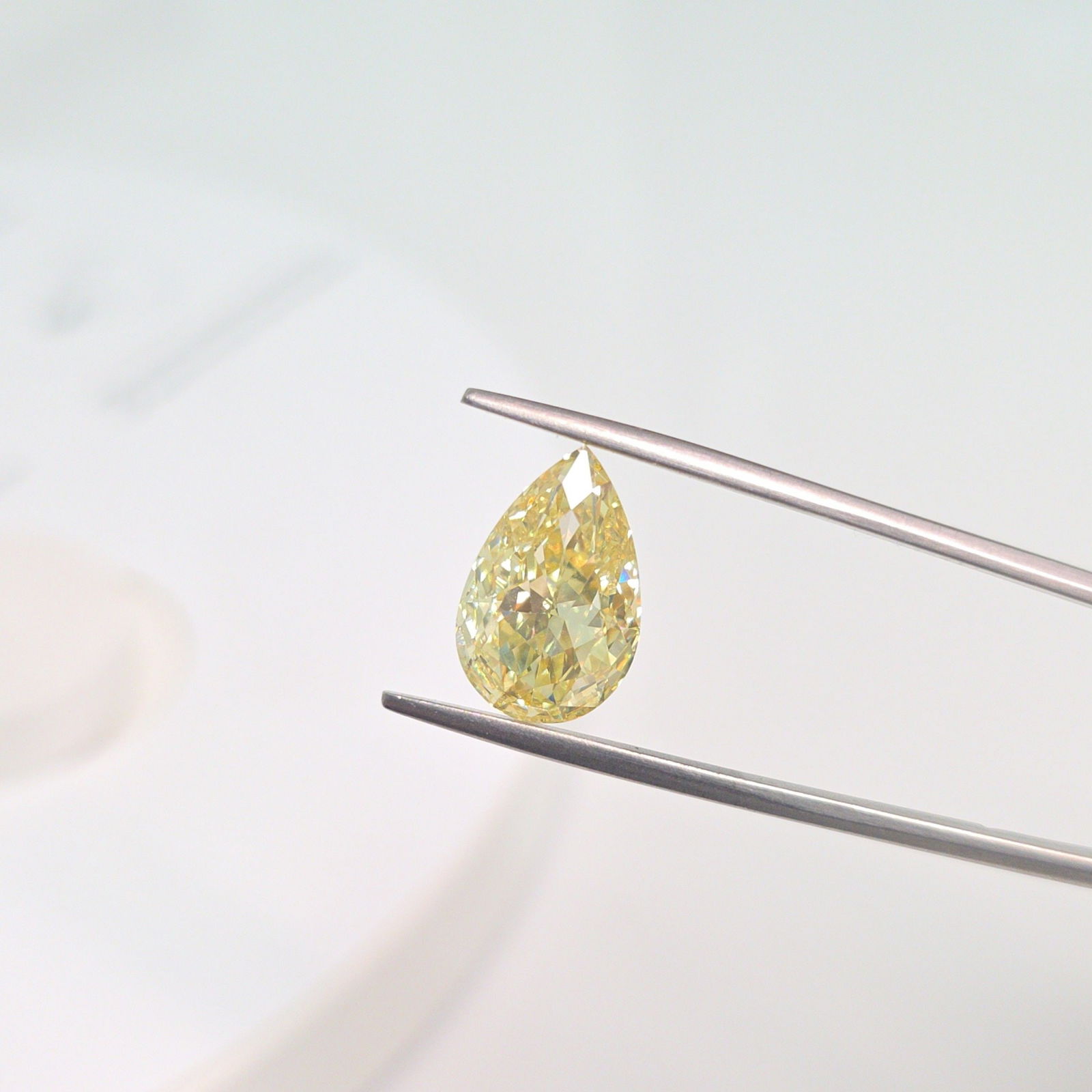 Loose Diamond - PEAR 5.23ct Fancy Intense Yellow VS1: Loose Diamond - PEAR 5.23ct Fancy Intense Yellow VS1 Source: This is a real non-mined Diamond that has been grown in a lab Shape: PEAR Carats: 5.23 Color: Fancy Intense Yellow Certification: IGI Video
