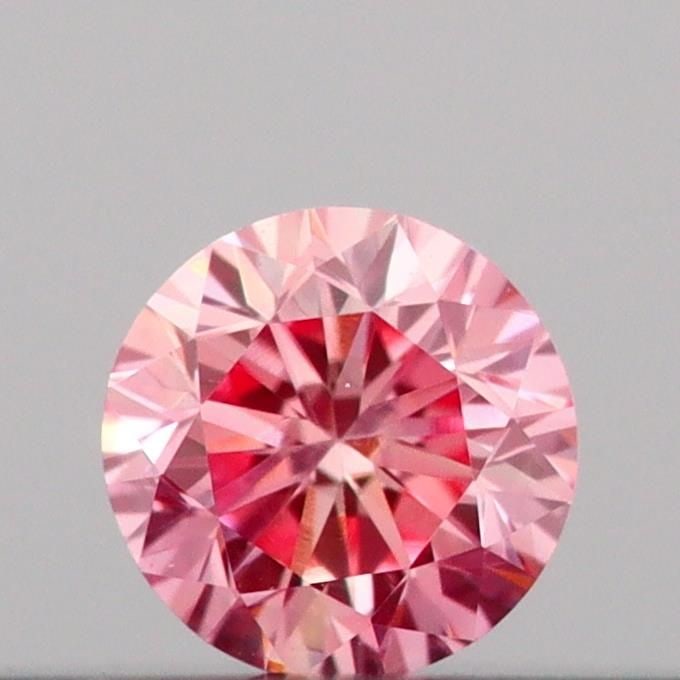 Loose Diamond - ROUND 0.11ct Fancy Vivid Pink VS1: Loose Diamond - ROUND 0.11ct Fancy Vivid Pink VS1 Source: This is a real non-mined Diamond that has been grown in a lab Shape: ROUND Carats: 0.11 Color: Fancy Vivid Pink Certification: IGI Video:
