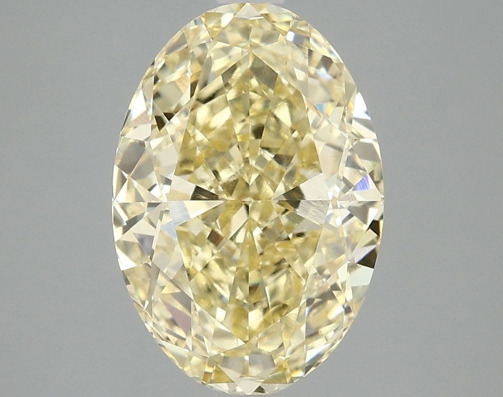 Loose Diamond - OVAL 4.03ct Fancy Vivid Yellow VS1: Loose Diamond - OVAL 4.03ct Fancy Vivid Yellow VS1 Source: This is a real non-mined Diamond that has been grown in a lab Shape: OVAL Carats: 4.03 Color: Fancy Vivid Yellow Certification: IGI Video:
