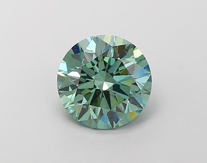 Loose Diamond - ROUND 1.56ct Fancy Vivid Green VS2: Loose Diamond - ROUND 1.56ct Fancy Vivid Green VS2 Source: This is a real non-mined Diamond that has been grown in a lab Shape: ROUND Carats: 1.56 Color: Fancy Vivid Green Certification: IGI Video:
