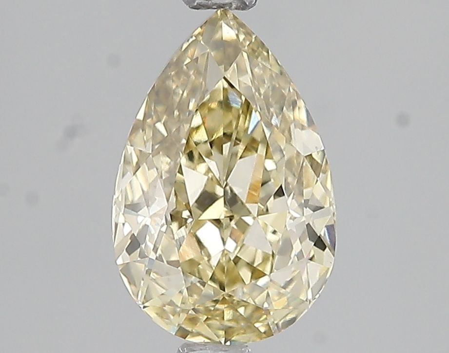 Loose Diamond - PEAR 2.03ct Fancy Yellow VVS2: Loose Diamond - PEAR 2.03ct Fancy Yellow VVS2 Source: This is a real non-mined Diamond that has been grown in a lab Shape: PEAR Carats: 2.03 Color: Fancy Yellow Certification: IGI Video: