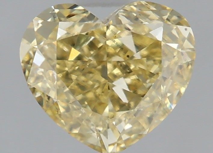 Loose Diamond - HEART 1.03ct Fancy Yellow VVS2: Loose Diamond - HEART 1.03ct Fancy Yellow VVS2 Source: This is a real non-mined Diamond that has been grown in a lab Shape: HEART Carats: 1.03 Color: Fancy Yellow Certification: IGI Video: