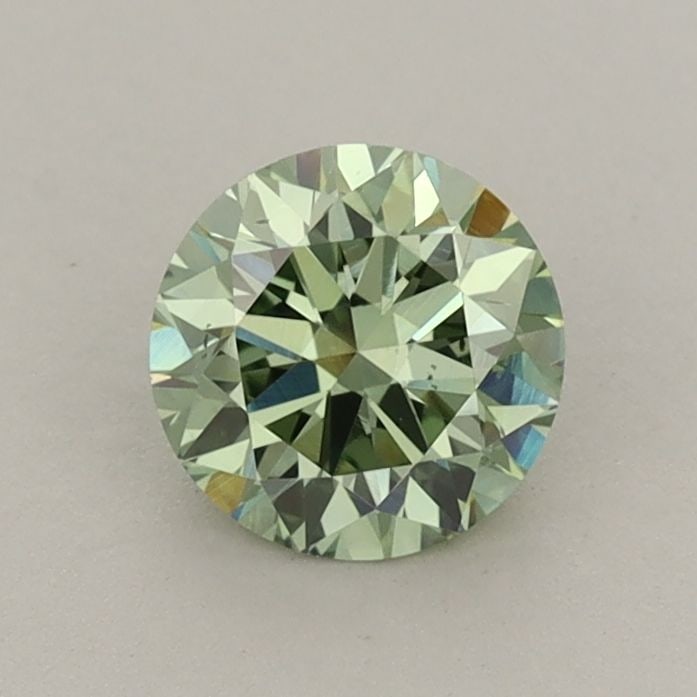 Loose Diamond - ROUND 0.76ct Fancy Vivid Green VS2: Loose Diamond - ROUND 0.76ct Fancy Vivid Green VS2 Source: This is a real non-mined Diamond that has been grown in a lab Shape: ROUND Carats: 0.76 Color: Fancy Vivid Green Certification: IGI Video: