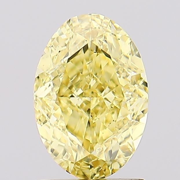 Loose Diamond - OVAL 1.47ct Fancy Vivid Yellow SI1: Loose Diamond - OVAL 1.47ct Fancy Vivid Yellow SI1 Source: This is a real non-mined Diamond that has been grown in a lab Shape: OVAL Carats: 1.47 Color: Fancy Vivid Yellow Certification: IGI Video: