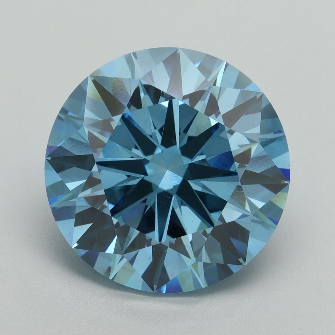 Loose Diamond - ROUND 9.01ct Fancy Vivid Blue VS1: Loose Diamond - ROUND 9.01ct Fancy Vivid Blue VS1 Source: This is a real non-mined Diamond that has been grown in a lab Shape: ROUND Carats: 9.01 Color: Fancy Vivid Blue Certification: IGI Video: