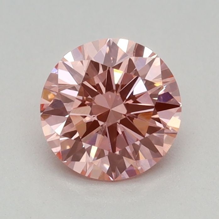 Loose Diamond - ROUND 0.42ct Fancy Vivid Pink VVS2: Loose Diamond - ROUND 0.42ct Fancy Vivid Pink VVS2 Source: This is a real non-mined Diamond that has been grown in a lab Shape: ROUND Carats: 0.42 Color: Fancy Vivid Pink Certification: IGI Video: