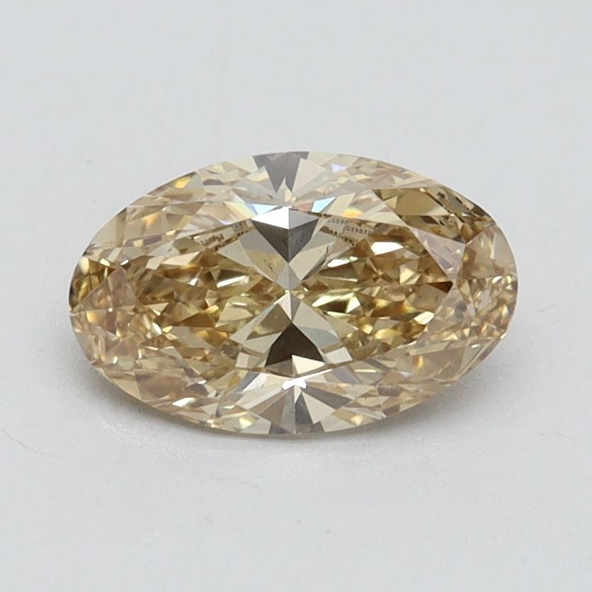 Loose Diamond - OVAL 1.01ct Fancy Brownish Yellow VS2: Loose Diamond - OVAL 1.01ct Fancy Brownish Yellow VS2 Source: This is a real non-mined Diamond that has been grown in a lab Shape: OVAL Carats: 1.01 Color: Fancy Brownish Yellow Certification: IGI Vid