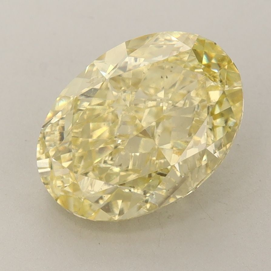 Loose Diamond - OVAL 3.28ct Fancy Vivid Yellow VS1: Loose Diamond - OVAL 3.28ct Fancy Vivid Yellow VS1 Source: This is a real non-mined Diamond that has been grown in a lab Shape: OVAL Carats: 3.28 Color: Fancy Vivid Yellow Certification: IGI Video: