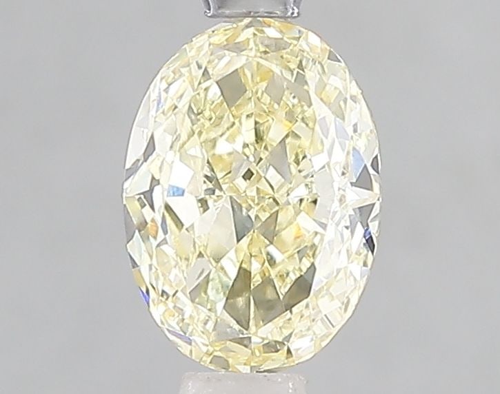 Loose Diamond - OVAL 1.02ct Fancy Yellow VS2: Loose Diamond - OVAL 1.02ct Fancy Yellow VS2 Source: This is a real non-mined Diamond that has been grown in a lab Shape: OVAL Carats: 1.02 Color: Fancy Yellow Certification: IGI Video: