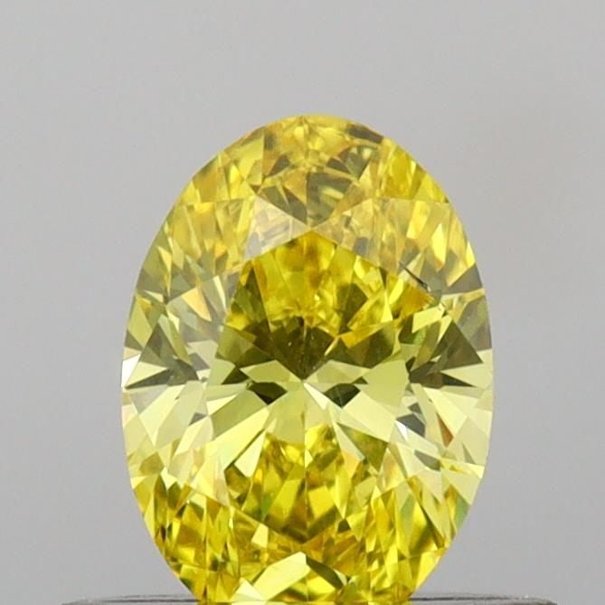 Loose Diamond - OVAL 0.5ct Fancy Vivid Yellow VS2: Loose Diamond - OVAL 0.5ct Fancy Vivid Yellow VS2 Source: This is a real non-mined Diamond that has been grown in a lab Shape: OVAL Carats: 0.5 Color: Fancy Vivid Yellow Certification: IGI Video: