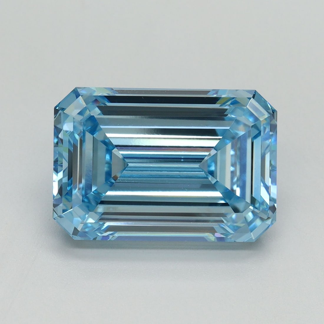Loose Diamond - EMERALD 7.04ct Fancy Vivid Blue VVS2: Loose Diamond - EMERALD 7.04ct Fancy Vivid Blue VVS2 Source: This is a real non-mined Diamond that has been grown in a lab Shape: EMERALD Carats: 7.04 Color: Fancy Vivid Blue Certification: IGI Video: