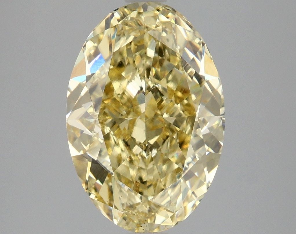 Loose Diamond - OVAL 4.09ct Fancy Intense Yellow VS1: Loose Diamond - OVAL 4.09ct Fancy Intense Yellow VS1 Source: This is a real non-mined Diamond that has been grown in a lab Shape: OVAL Carats: 4.09 Color: Fancy Intense Yellow Certification: IGI Video