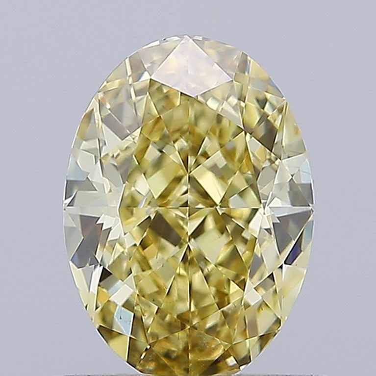 Loose Diamond - OVAL 1.04ct Fancy Yellow VS2: Loose Diamond - OVAL 1.04ct Fancy Yellow VS2 Source: This is a real non-mined Diamond that has been grown in a lab Shape: OVAL Carats: 1.04 Color: Fancy Yellow Certification: IGI Video: