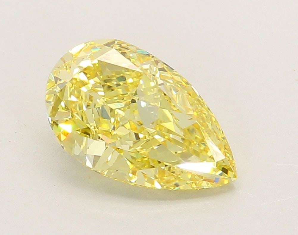 Loose Diamond - PEAR 2.6ct Fancy Vivid Yellow VVS2: Loose Diamond - PEAR 2.6ct Fancy Vivid Yellow VVS2 Source: This is a real non-mined Diamond that has been grown in a lab Shape: PEAR Carats: 2.6 Color: Fancy Vivid Yellow Certification: IGI Video:
