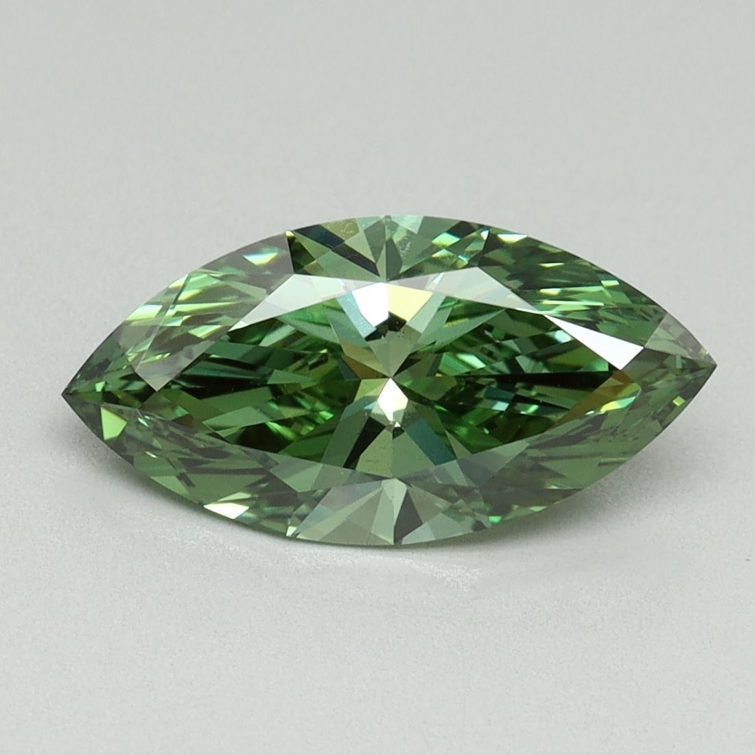 Loose Diamond - MARQUISE 1.73ct Fancy Vivid Green VS2: Loose Diamond - MARQUISE 1.73ct Fancy Vivid Green VS2 Source: This is a real non-mined Diamond that has been grown in a lab Shape: MARQUISE Carats: 1.73 Color: Fancy Vivid Green Certification: IGI Vid
