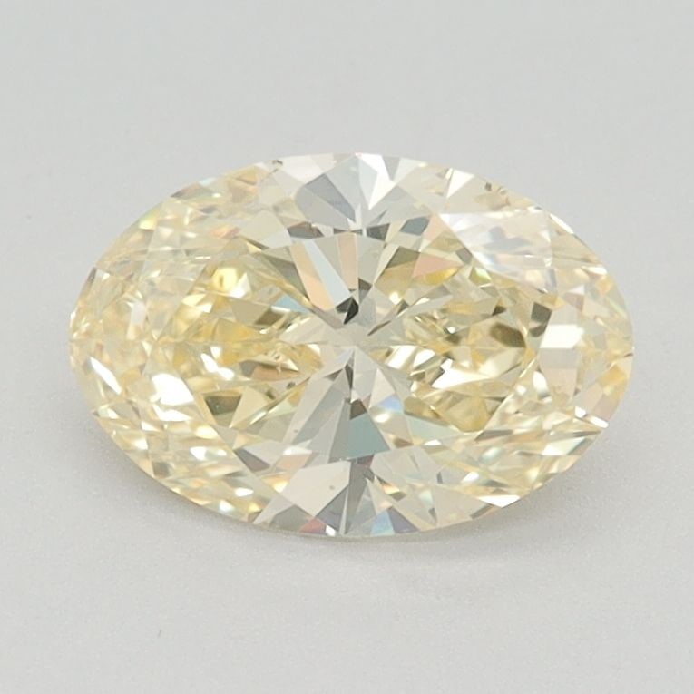 Loose Diamond - OVAL 1.03ct Fancy Vivid Yellow VVS2: Loose Diamond - OVAL 1.03ct Fancy Vivid Yellow VVS2 Source: This is a real non-mined Diamond that has been grown in a lab Shape: OVAL Carats: 1.03 Color: Fancy Vivid Yellow Certification: IGI Video: