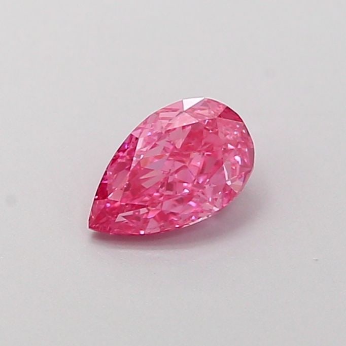 Loose Diamond - PEAR 0.38ct Fancy Vivid Pink VS1: Loose Diamond - PEAR 0.38ct Fancy Vivid Pink VS1 Source: This is a real non-mined Diamond that has been grown in a lab Shape: PEAR Carats: 0.38 Color: Fancy Vivid Pink Certification: IGI Video: