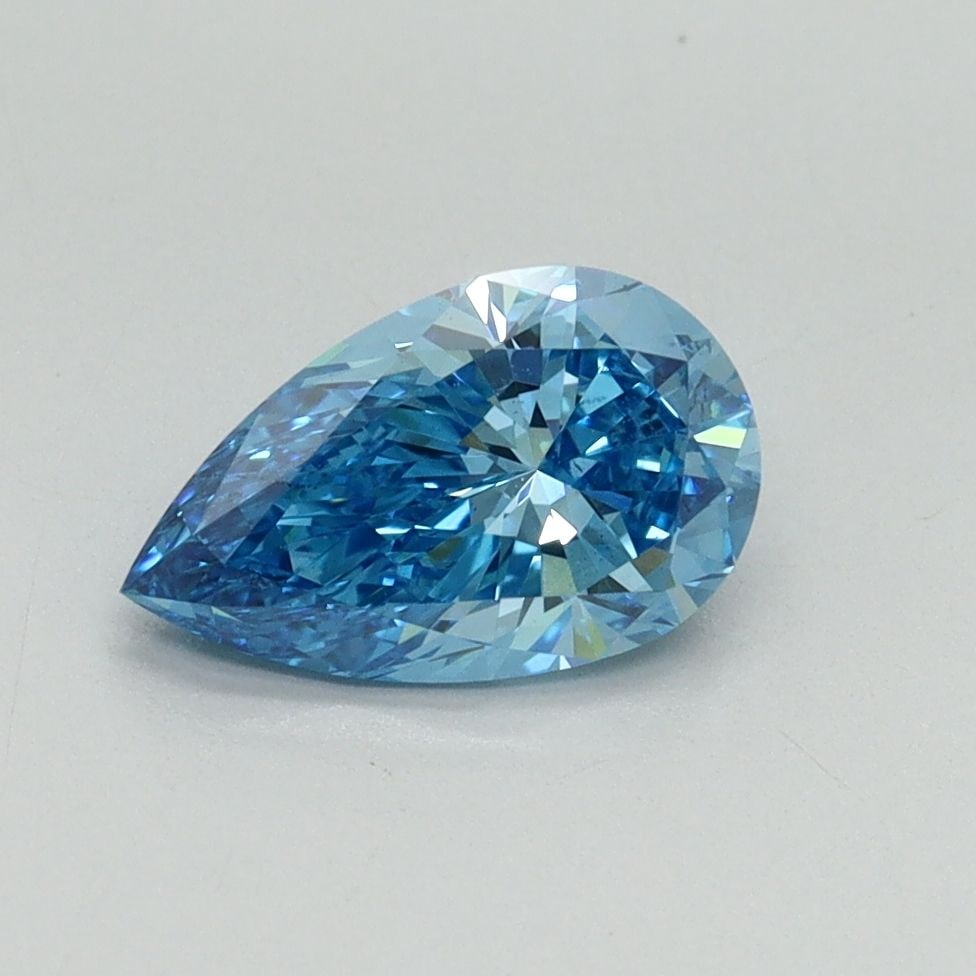 Loose Diamond - PEAR 1.01ct Fancy Vivid Blue VS2: Loose Diamond - PEAR 1.01ct Fancy Vivid Blue VS2 Source: This is a real non-mined Diamond that has been grown in a lab Shape: PEAR Carats: 1.01 Color: Fancy Vivid Blue Certification: IGI Video: