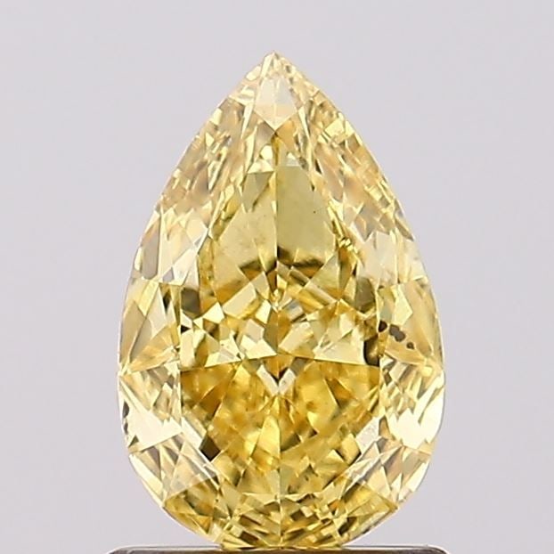 Loose Diamond - PEAR 1.04ct Fancy Vivid Yellow VS2: Loose Diamond - PEAR 1.04ct Fancy Vivid Yellow VS2 Source: This is a real non-mined Diamond that has been grown in a lab Shape: PEAR Carats: 1.04 Color: Fancy Vivid Yellow Certification: IGI Video: