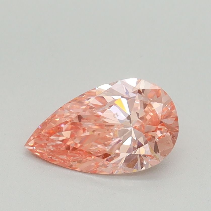 Loose Diamond - PEAR 0.72ct Fancy Vivid Pink SI1: Loose Diamond - PEAR 0.72ct Fancy Vivid Pink SI1 Source: This is a real non-mined Diamond that has been grown in a lab Shape: PEAR Carats: 0.72 Color: Fancy Vivid Pink Certification: IGI Video: