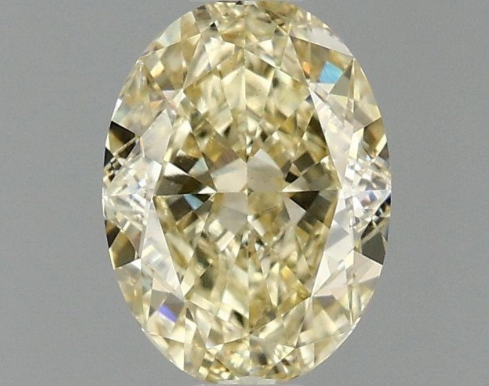 Loose Diamond - OVAL 1.1ct Fancy Yellow VS1: Loose Diamond - OVAL 1.1ct Fancy Yellow VS1 Source: This is a real non-mined Diamond that has been grown in a lab Shape: OVAL Carats: 1.1 Color: Fancy Yellow Certification: IGI Video: