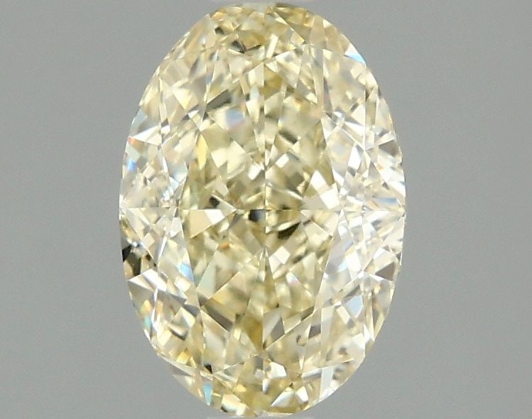 Loose Diamond - OVAL 1.59ct Fancy Yellow VVS2: Loose Diamond - OVAL 1.59ct Fancy Yellow VVS2 Source: This is a real non-mined Diamond that has been grown in a lab Shape: OVAL Carats: 1.59 Color: Fancy Yellow Certification: IGI Video: