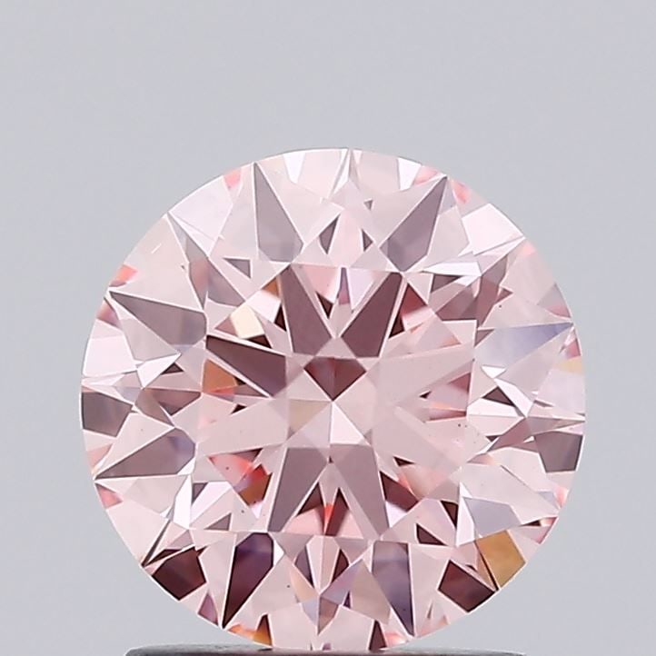Ideal Loose Diamond - ROUND 1.65ct Fancy Vivid Pink VS1: Ideal Loose Diamond - ROUND 1.65ct Fancy Vivid Pink VS1 Source: This is a real non-mined Diamond that has been grown in a lab Shape: ROUND Carats: 1.65 Color: Fancy Vivid Pink Certification: IGI Video