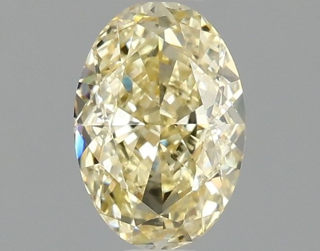 Loose Diamond - OVAL 1.1ct Fancy Yellow VVS2: Loose Diamond - OVAL 1.1ct Fancy Yellow VVS2 Source: This is a real non-mined Diamond that has been grown in a lab Shape: OVAL Carats: 1.1 Color: Fancy Yellow Certification: IGI Video: