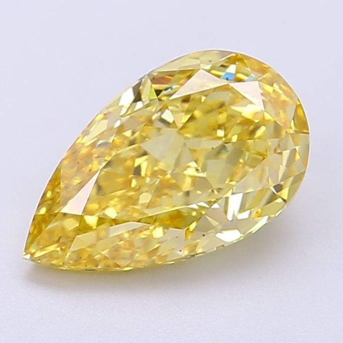 Loose Diamond - PEAR 2.17ct Fancy Vivid Yellow VS2: Loose Diamond - PEAR 2.17ct Fancy Vivid Yellow VS2 Source: This is a real non-mined Diamond that has been grown in a lab Shape: PEAR Carats: 2.17 Color: Fancy Vivid Yellow Certification: IGI Video: