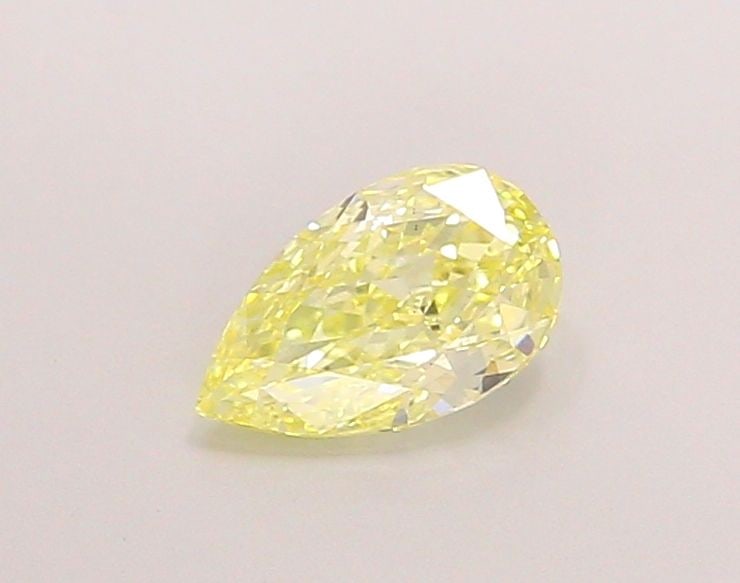 Loose Diamond - PEAR 0.93ct Fancy Yellow VS2: Loose Diamond - PEAR 0.93ct Fancy Yellow VS2 Source: This is a real non-mined Diamond that has been grown in a lab Shape: PEAR Carats: 0.93 Color: Fancy Yellow Certification: IGI Video: