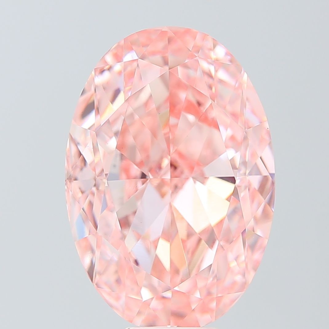 Loose Diamond - OVAL 13.36ct Fancy Vivid Pink VVS2: Loose Diamond - OVAL 13.36ct Fancy Vivid Pink VVS2 Source: This is a real non-mined Diamond that has been grown in a lab Shape: OVAL Carats: 13.36 Color: Fancy Vivid Pink Certification: IGI Video: