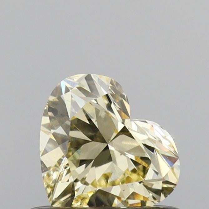 Loose Diamond - HEART 0.51ct Fancy Yellow VS2: Loose Diamond - HEART 0.51ct Fancy Yellow VS2 Source: This is a real non-mined Diamond that has been grown in a lab Shape: HEART Carats: 0.51 Color: Fancy Yellow Certification: IGI Video: