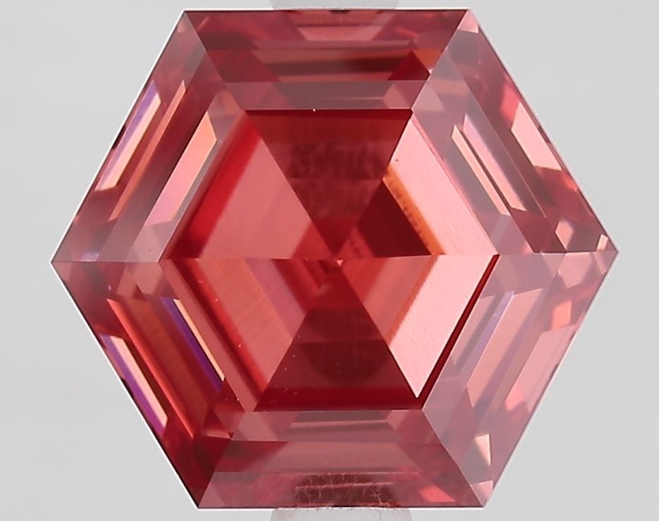 Loose Diamond - HEXAGONAL 2.26ct Fancy Vivid Pink VVS2: Loose Diamond - HEXAGONAL 2.26ct Fancy Vivid Pink VVS2 Source: This is a real non-mined Diamond that has been grown in a lab Shape: HEXAGONAL Carats: 2.26 Color: Fancy Vivid Pink Certification: IGI Vi