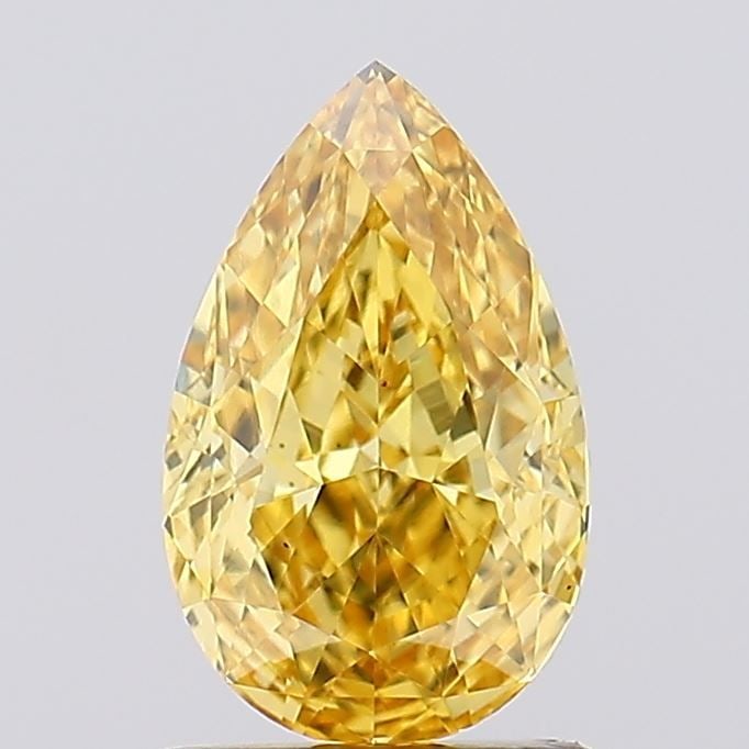 Loose Diamond - PEAR 1.31ct Fancy Vivid Yellow VS1: Loose Diamond - PEAR 1.31ct Fancy Vivid Yellow VS1 Source: This is a real non-mined Diamond that has been grown in a lab Shape: PEAR Carats: 1.31 Color: Fancy Vivid Yellow Certification: IGI Video: