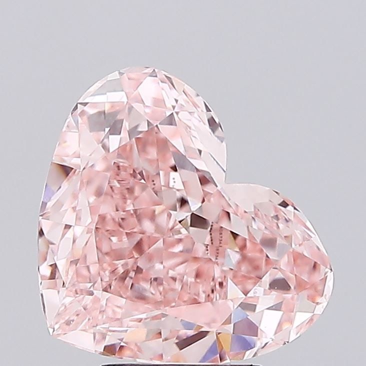 Loose Diamond - HEART 5.06ct Fancy Vivid Pink VS1: Loose Diamond - HEART 5.06ct Fancy Vivid Pink VS1 Source: This is a real non-mined Diamond that has been grown in a lab Shape: HEART Carats: 5.06 Color: Fancy Vivid Pink Certification: IGI Video: