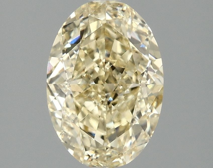 Loose Diamond - OVAL 2.03ct Fancy Vivid Yellow VVS2: Loose Diamond - OVAL 2.03ct Fancy Vivid Yellow VVS2 Source: This is a real non-mined Diamond that has been grown in a lab Shape: OVAL Carats: 2.03 Color: Fancy Vivid Yellow Certification: IGI Video: