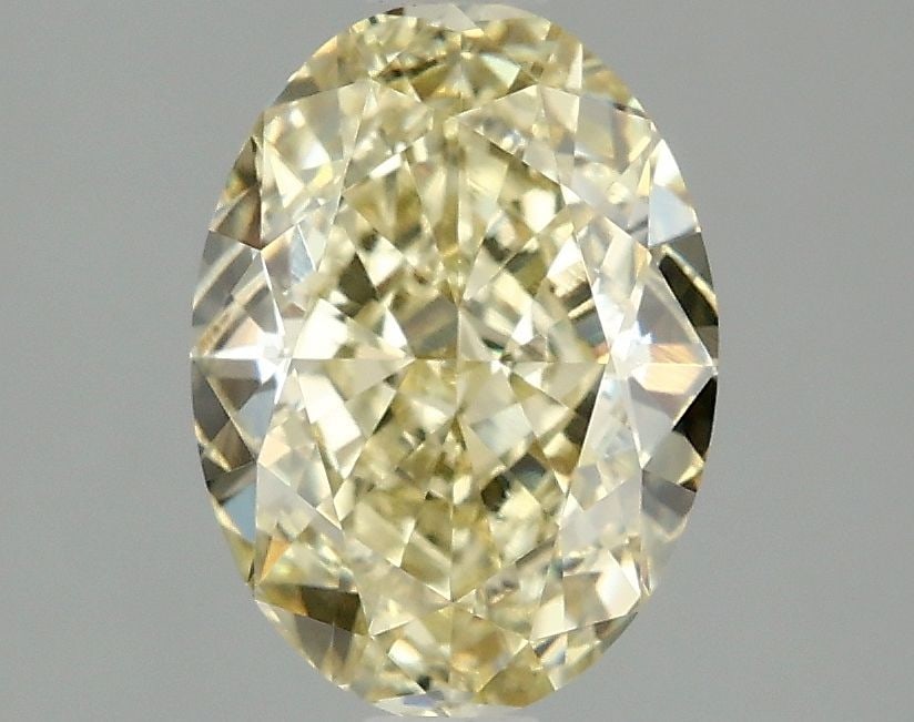Loose Diamond - OVAL 2.1ct Fancy Intense Yellow VVS2: Loose Diamond - OVAL 2.1ct Fancy Intense Yellow VVS2 Source: This is a real non-mined Diamond that has been grown in a lab Shape: OVAL Carats: 2.1 Color: Fancy Intense Yellow Certification: IGI Video: