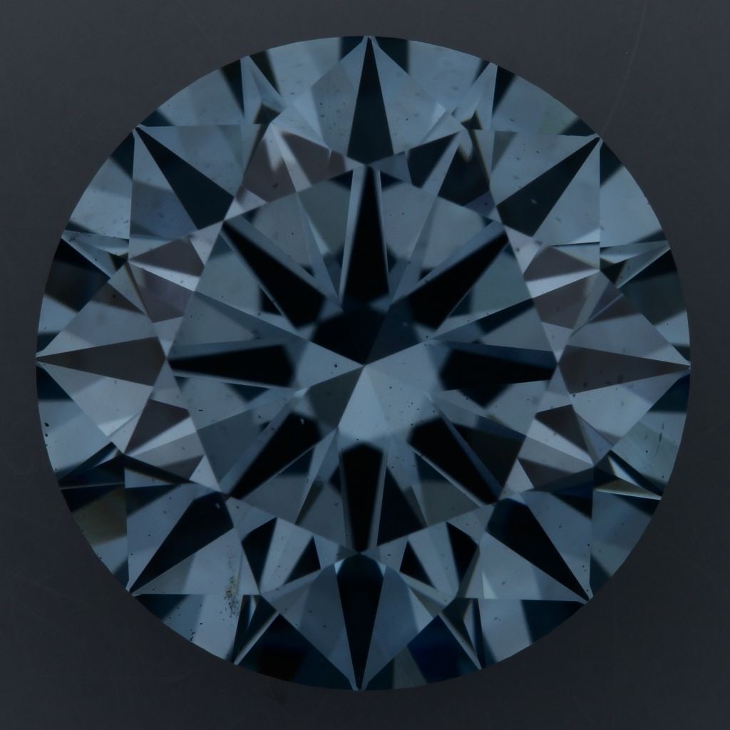 Ideal Loose Diamond - ROUND 4.01ct Fancy Vivid Blue VS2: Ideal Loose Diamond - ROUND 4.01ct Fancy Vivid Blue VS2 Source: This is a real non-mined Diamond that has been grown in a lab Shape: ROUND Carats: 4.01 Color: Fancy Vivid Blue Certification: IGI Video