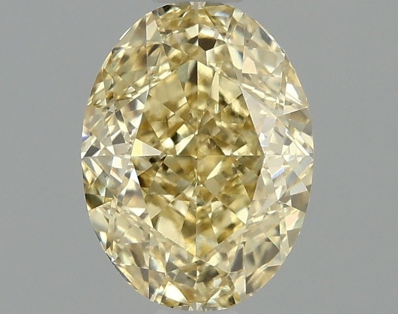 Loose Diamond - OVAL 1.04ct Fancy Intense Yellow VS1: Loose Diamond - OVAL 1.04ct Fancy Intense Yellow VS1 Source: This is a real non-mined Diamond that has been grown in a lab Shape: OVAL Carats: 1.04 Color: Fancy Intense Yellow Certification: IGI Video