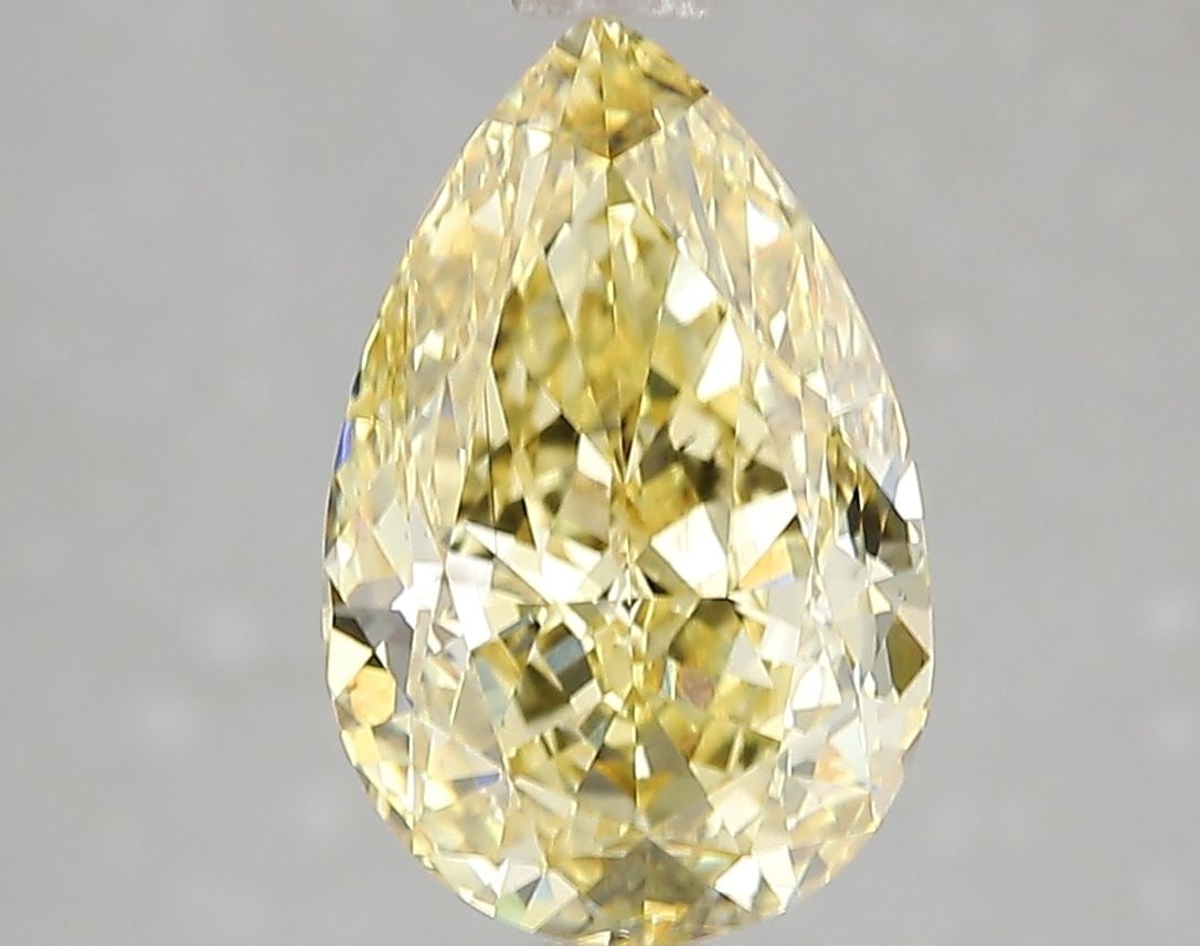 Loose Diamond - PEAR 3.03ct Fancy Vivid Yellow SI1: Loose Diamond - PEAR 3.03ct Fancy Vivid Yellow SI1 Source: This is a real non-mined Diamond that has been grown in a lab Shape: PEAR Carats: 3.03 Color: Fancy Vivid Yellow Certification: IGI Video: