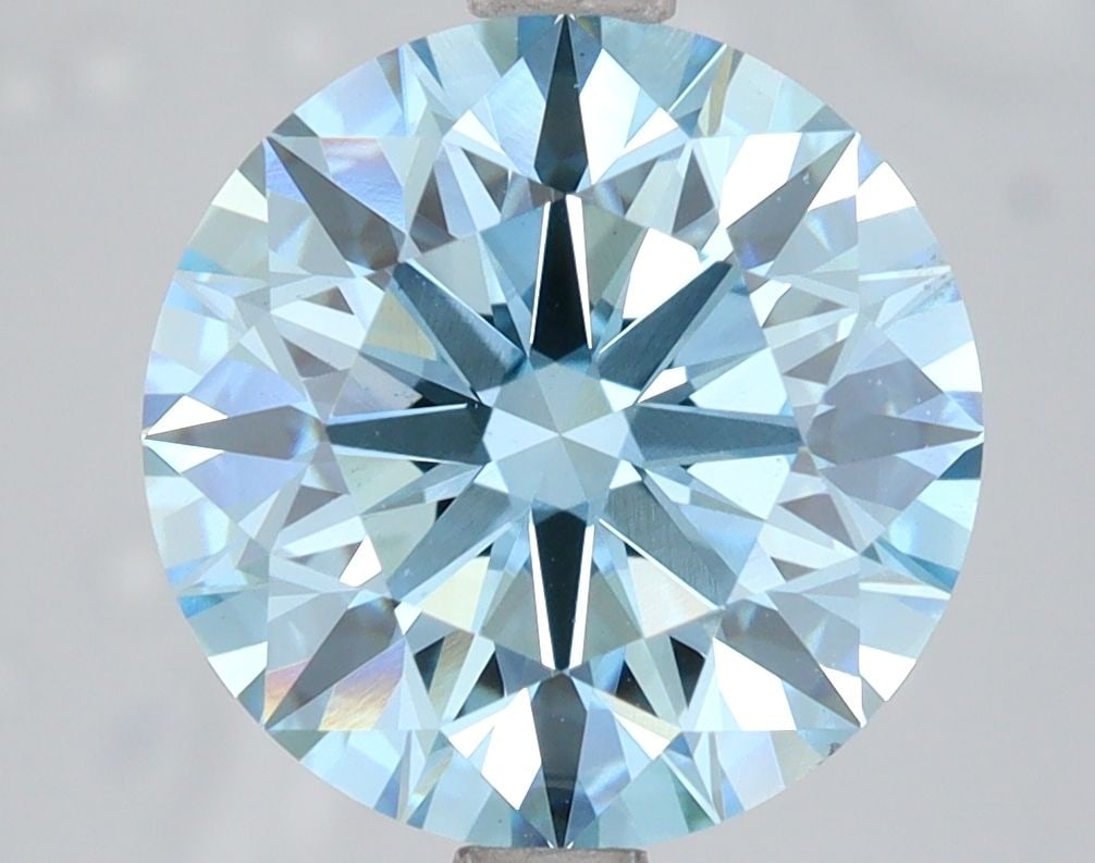 Ideal Loose Diamond - ROUND 4.0ct Fancy Vivid Blue VS1: Ideal Loose Diamond - ROUND 4.0ct Fancy Vivid Blue VS1 Source: This is a real non-mined Diamond that has been grown in a lab Shape: ROUND Carats: 4.0 Color: Fancy Vivid Blue Certification: IGI Video: