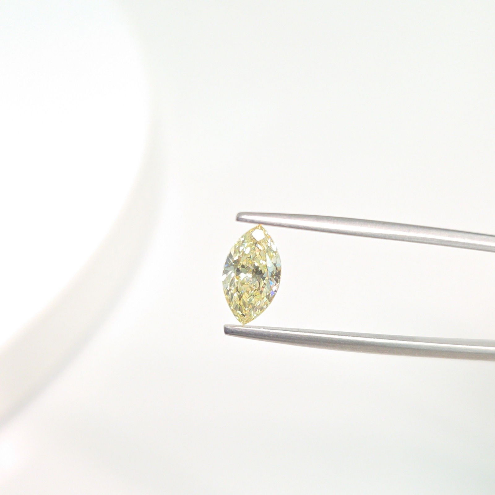 Loose Diamond - MARQUISE 1.1ct Fancy Light Yellow VVS2: Loose Diamond - MARQUISE 1.1ct Fancy Light Yellow VVS2 Source: This is a real non-mined Diamond that has been grown in a lab Shape: MARQUISE Carats: 1.1 Color: Fancy Light Yellow Certification: IGI Vi