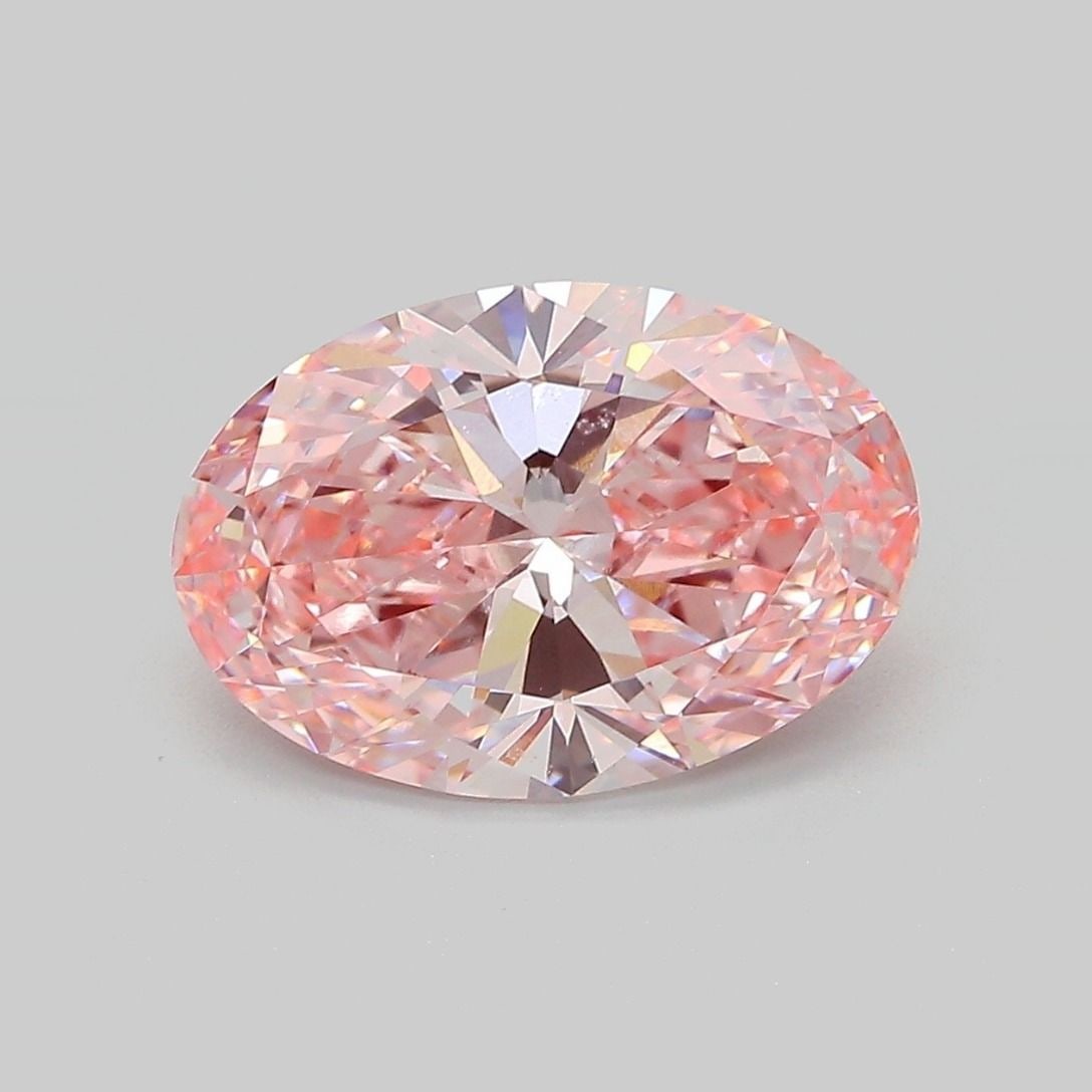 Loose Diamond - OVAL 3.31ct Fancy Vivid Pink VVS2: Loose Diamond - OVAL 3.31ct Fancy Vivid Pink VVS2 Source: This is a real non-mined Diamond that has been grown in a lab Shape: OVAL Carats: 3.31 Color: Fancy Vivid Pink Certification: IGI Video: