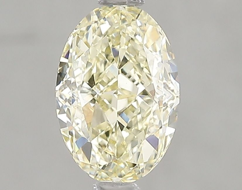 Loose Diamond - OVAL 1.57ct Fancy Light Yellow VS1: Loose Diamond - OVAL 1.57ct Fancy Light Yellow VS1 Source: This is a real non-mined Diamond that has been grown in a lab Shape: OVAL Carats: 1.57 Color: Fancy Light Yellow Certification: IGI Video: