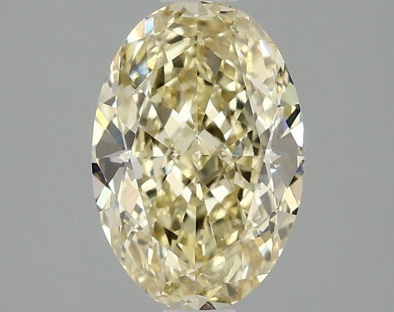 Loose Diamond - OVAL 2.1ct Fancy Intense Yellow VS1: Loose Diamond - OVAL 2.1ct Fancy Intense Yellow VS1 Source: This is a real non-mined Diamond that has been grown in a lab Shape: OVAL Carats: 2.1 Color: Fancy Intense Yellow Certification: IGI Video: